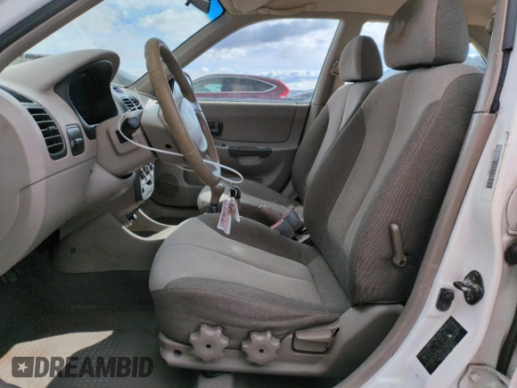2002 Hyundai Accent GL with VIN KMHCG45C82U358523, listed as a Copart auction lot 48247575 with 164,869 mi miles and Salvage Title. Bid and sale history available at carsss.com. Image 7.