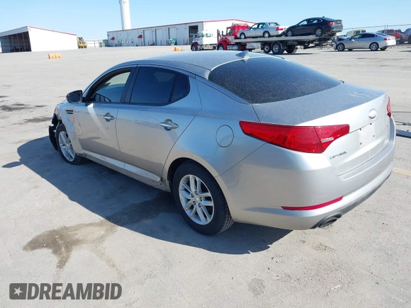 2013 Kia Optima LX with VIN KNAGM4A73D5356339, listed as a IAAI auction lot 41979364 with 140,000 mi miles. Bid and sale history available at carsss.com. Image 3.
