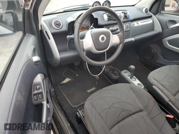 2015 Smart fortwo Passion z VIN WMEEJ9AA9FK834118, wystawiony jako Copart lot #45891925 z przebiegiem Nie podano mil oraz Czysty tytuł • Clean title. Historia ofert i sprzedaży dostępna na DreamBid. Obrazek 8.
