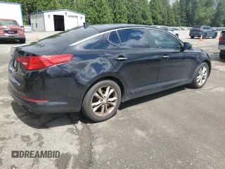 2013 Kia Optima LX z VIN 5XXGM4A79DG144608, wystawiony jako Copart lot #57461585 z przebiegiem 120 677 mil mil oraz Szkoda całkowita • Salvage title. Historia ofert i sprzedaży dostępna na DreamBid. Obrazek 3.