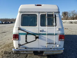 1994 Chevrolet Chevy Van z VIN 1GBEG25KXRF155175, wystawiony jako Copart lot #46681995 z przebiegiem 217 446 mil mil oraz Szkoda całkowita • Salvage title. Historia ofert i sprzedaży dostępna na DreamBid. Obrazek 6.