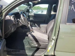 2022 Toyota Tacoma SR с VIN 3TMCZ5AN8NM519084, выставлен на аукционе Copart как лот 57512005 с пробегом 23 692 миль миль и Списание • Salvage title. История ставок и продаж доступна на DreamBid. Изображение 7.