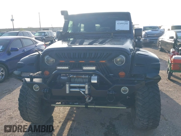 2017 Jeep Wrangler Unlimited Sport with VIN 1C4BJWDG8HL567051, listed as a IAAI auction lot 42495250 with 19,522 mi miles and . Bid and sale history available at DreamBid. Image 12.