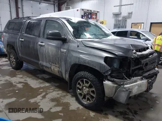 2014 Toyota Tundra 4WD Truck SR5 with VIN 5TFDW5F10EX342818, listed as a IAAI auction lot 41067866 with 226,988 mi miles. Bid and sale history available at carsss.com. Image 1.