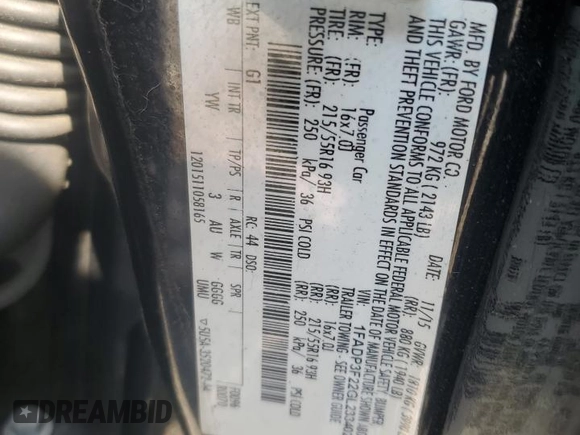 2016 Ford Focus SE with VIN 1FADP3F22GL233402, listed as a Copart auction lot 60854175 with 77,002 mi miles and Salvage title. Bid and sale history available at DreamBid. Image 13.
