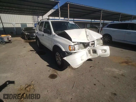 2004 Isuzu Rodeo S z VIN 4S2CK58W044317034, wystawiony jako Copart lot #42401765 z przebiegiem 110 639 mil mil oraz Szkoda całkowita • Salvage title. Historia ofert i sprzedaży dostępna na DreamBid. Obrazek 11.