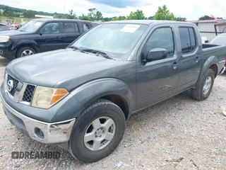 2005 Nissan Frontier LE with VIN 1N6AD07U45C451534, listed as a IAAI auction lot 42643704 with 233,237 mi miles and . Bid and sale history available at DreamBid. Image 2.
