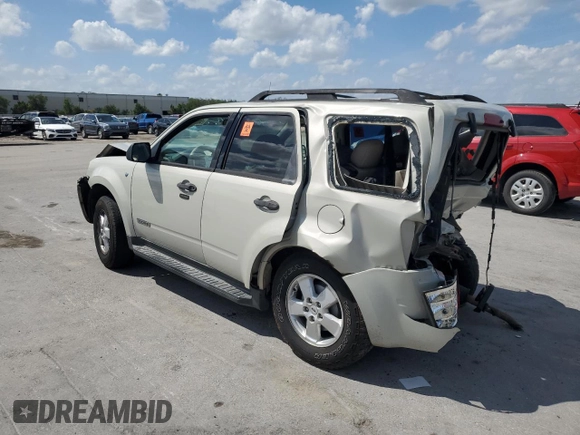 2008 Ford Escape XLT with VIN 1FMCU93128KA46421, listed as a Copart auction lot 50521245 with 251,985 mi miles and Salvage title. Bid and sale history available at DreamBid. Image 2.