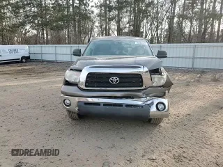 2009 Toyota Tundra z VIN 5TFBT54129X015491, wystawiony jako Copart lot #50884015 z przebiegiem 142 533 mil mil oraz Szkody całkowita. Historia ofert i sprzedaży dostępna na DreamBid. Obrazek 10.
