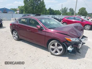 2014 Acura ILX Premium z VIN 19VDE1F57EE005019, wystawiony jako IAAI lot #39902244 z przebiegiem 57 151 mil mil oraz . Historia ofert i sprzedaży dostępna na DreamBid. Obrazek 1.