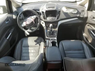 2016 Ford C-Max Energi SEL with VIN 1FADP5CU0GL101658, listed as a Copart auction lot 68214393 with 66,390 mi miles. Bid and sale history available at carsss.com. Image 8.