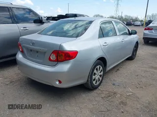 2009 Toyota Corolla with VIN JTDBL40E099041319, listed as a IAAI auction lot 42119698 with 205,666 mi miles. Bid and sale history available at carsss.com. Image 4.