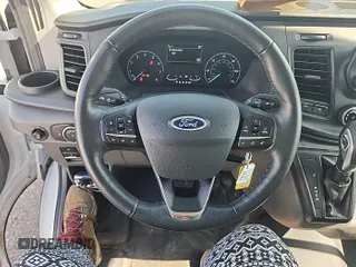2023 Ford Transit Passenger XL z VIN 1FBAX9C86PKA70756, wystawiony jako IAAI lot #42731060 z przebiegiem 23 399 mil mil oraz . Historia ofert i sprzedaży dostępna na DreamBid. Obrazek 10.