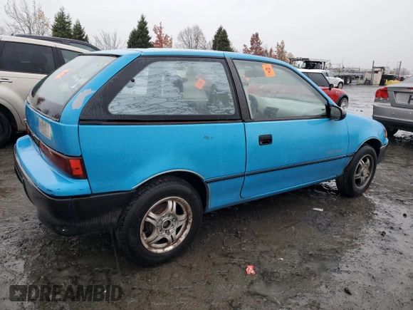 1992 Geo Metro z VIN 2C1MR2467N6724779, wystawiony jako Copart lot #81355814 z przebiegiem 85 587 mil mil oraz Szkody całkowita. Historia ofert i sprzedaży dostępna na DreamBid. Obrazek 3.