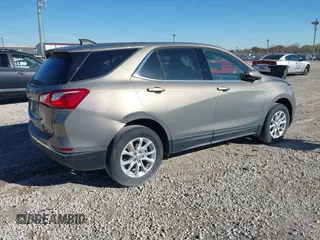 2018 Chevrolet Equinox LT z VIN 3GNAXSEV7JS621706, wystawiony jako IAAI lot #40760827 z przebiegiem 36 051 mil mil oraz . Historia ofert i sprzedaży dostępna na DreamBid. Obrazek 4.