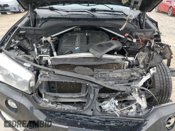 2014 BMW X5 xDrive35i z VIN 5UXKR0C59E0H23070, wystawiony jako Copart lot #55814815 z przebiegiem 113 895 mil mil oraz Szkody całkowita. Historia ofert i sprzedaży dostępna na DreamBid. Obrazek 11.