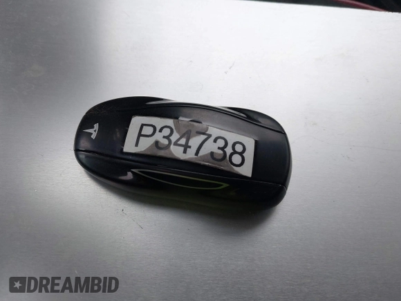 2014 Tesla Model S 60 with VIN 5YJSA1H14EFP34738, listed as a IAAI auction lot 42132117 with 120,898 mi miles and . Bid and sale history available at DreamBid. Image 11.
