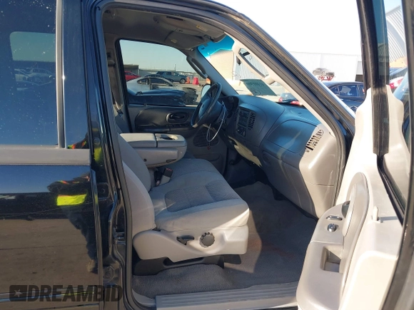 2002 Ford F-150 XLT with VIN 1FTRW07622KD31203, listed as a IAAI auction lot 41401506 with 166,949 mi miles. Bid and sale history available at carsss.com. Image 5.