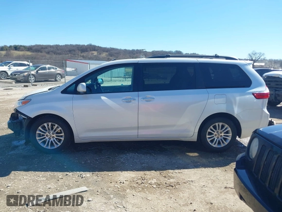 2015 Toyota Sienna XLE with VIN 5TDYK3DC7FS661582, listed as a IAAI auction lot 41688972 with 145,953 mi miles. Bid and sale history available at carsss.com. Image 15.