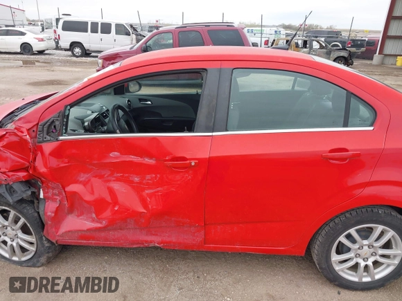 2012 Chevrolet Sonic LT with VIN 1G1JC5SH7C4133484, listed as a IAAI auction lot 42076809 with 100,506 mi miles and . Bid and sale history available at DreamBid. Image 14.