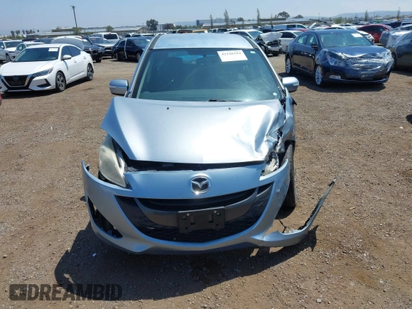2013 Mazda 5 Touring with VIN JM1CW2CL8D0145628, listed as a IAAI auction lot 42148184 with 137,150 mi miles and . Bid and sale history available at DreamBid. Image 12.