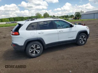 2014 Jeep Cherokee Trailhawk z VIN 1C4PJMBS5EW201897, wystawiony jako Copart lot #57378795 z przebiegiem 172 715 mil mil oraz Szkody całkowita. Historia ofert i sprzedaży dostępna na DreamBid. Obrazek 3.