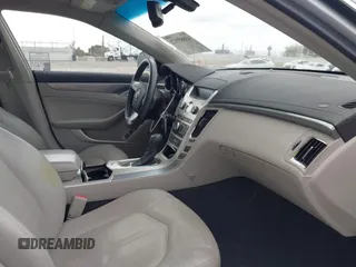 2013 Cadillac CTS Performance with VIN 1G6DJ5E32D0175793, listed as a IAAI auction lot 41885572 with 109,243 mi miles and . Bid and sale history available at DreamBid. Image 5.