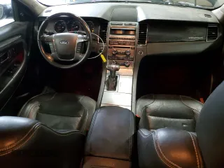 2012 Ford Taurus Limited с VIN 1FAHP2FW7CG100698, выставлен на аукционе Copart как лот 59015515 с пробегом 190 295 миль миль и Списание • Salvage title. История ставок и продаж доступна на DreamBid. Изображение 8.