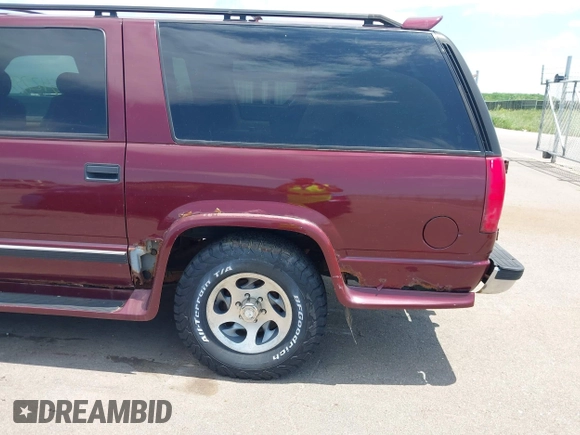 1999 Chevrolet Suburban with VIN 1GBFK16R5XJ335005, listed as a IAAI auction lot 42542755 with 200,599 mi miles and . Bid and sale history available at DreamBid. Image 6.