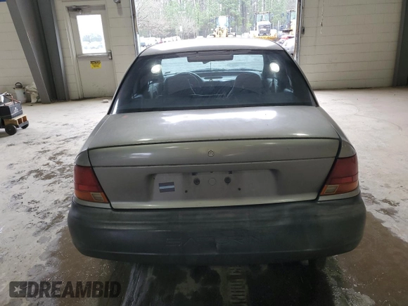 1998 Saturn SL with VIN 1G8ZF5285WZ204569, listed as a Copart auction lot 43624765 with 318,544 mi miles and Salvage Title. Bid and sale history available at carsss.com. Image 6.