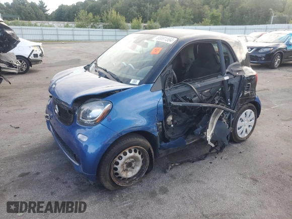 2016 Smart fortwo Passion z VIN WMEFJ5DA0GK076339, wystawiony jako Copart lot #68891564 z przebiegiem Nie podano mil oraz Szkoda całkowita • Salvage title. Historia ofert i sprzedaży dostępna na DreamBid. Obrazek 1.