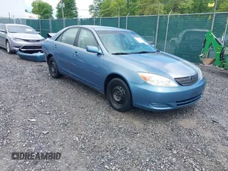 2002 Toyota Camry LE z VIN 4T1BE32KX2U586028, wystawiony jako IAAI lot #42211792 z przebiegiem 222 101 mil mil oraz . Historia ofert i sprzedaży dostępna na DreamBid. Obrazek 1.