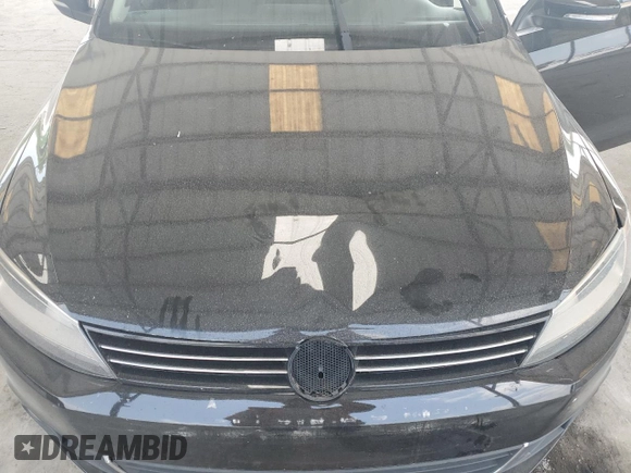 2012 Volkswagen Jetta SEL with VIN 3VWLX7AJ2CM409477, listed as a Copart auction lot 59476915 with 156,035 mi miles and Salvage title. Bid and sale history available at DreamBid. Image 11.