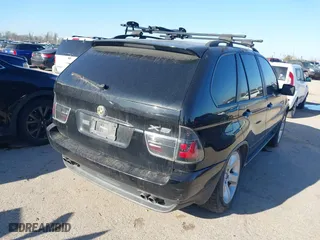 2004 BMW X5 4.4i with VIN 5UXFB53504LV06486, listed as a IAAI auction lot 41674534 with 164,974 mi miles. Bid and sale history available at carsss.com. Image 4.