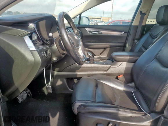 2018 Cadillac XT5 Luxury FWD with VIN 1GYKNCRS2JZ208016, listed as a Copart auction lot 61551285 with 145,019 mi miles and Salvage title. Bid and sale history available at DreamBid. Image 7.