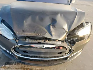 2013 Tesla Model S with VIN 5YJSA1CG0DFP15615, listed as a Copart auction lot 50795235 with 156,030 mi miles and Salvage title. Bid and sale history available at DreamBid. Image 11.