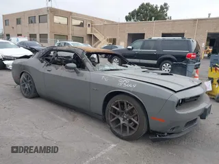 2017 Dodge Challenger R/T Shaker z VIN 2C3CDZBTXHH663987, wystawiony jako IAAI lot #40367339 z przebiegiem Nie podano mil oraz . Historia ofert i sprzedaży dostępna na DreamBid. Obrazek 1.