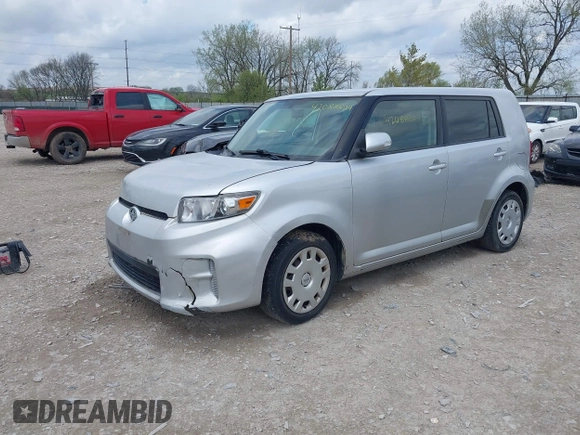 2012 Scion xB with VIN JTLZE4FE5CJ017513, listed as a IAAI auction lot 42088804 with 175,680 mi miles. Bid and sale history available at carsss.com. Image 2.