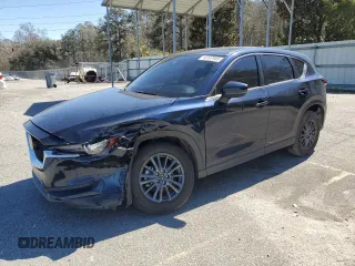 2021 Mazda CX-5 Touring with VIN JM3KFACM1M0442455, listed as a Copart auction lot 48187985 with 49,970 mi miles and Salvage Title. Bid and sale history available at carsss.com. Image 1.