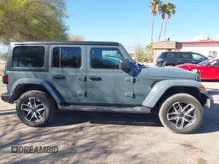 2024 Jeep Wrangler Willys z VIN 1C4RJXN65RW132000, wystawiony jako IAAI lot #41839686 z przebiegiem 14 796 mil mil oraz . Historia ofert i sprzedaży dostępna na DreamBid. Obrazek 13.