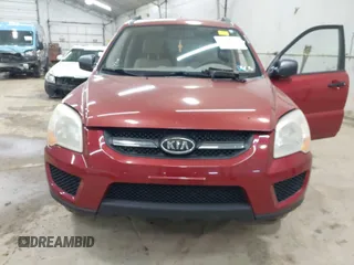 2009 Kia Sportage LX with VIN KNDJE723497555026, listed as a IAAI auction lot 42102679 with 136,398 mi miles. Bid and sale history available at carsss.com. Image 6.