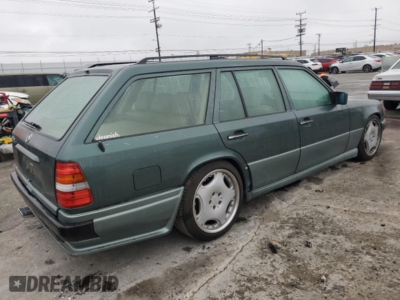 1993 Mercedes-Benz 300 with VIN WDBEA92E7PF259851, listed as a Copart auction lot 50561015 with 214,346 mi miles and Salvage Title. Bid and sale history available at DreamBid. Image 3.