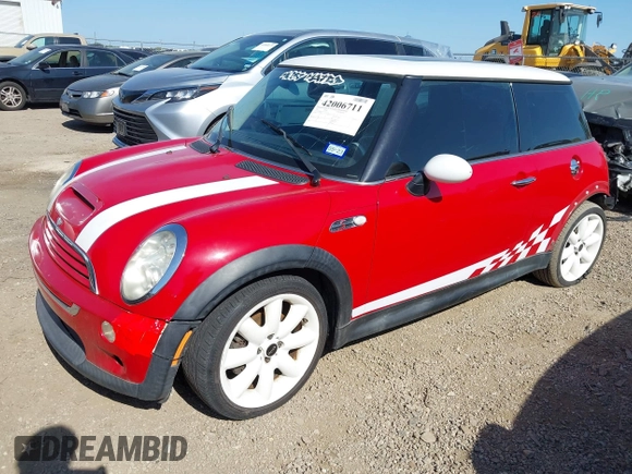 2005 MINI Hardtop S with VIN WMWRE33415TD92159, listed as a IAAI auction lot 42006711 with 110,935 mi miles and . Bid and sale history available at DreamBid. Image 2.