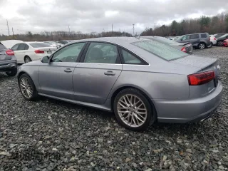 2016 Audi A6 2.0T Premium Plus with VIN WAUGFAFC1GN008929, listed as a Copart auction lot 49772575 with 123,809 mi miles and Salvage Title. Bid and sale history available at carsss.com. Image 2.