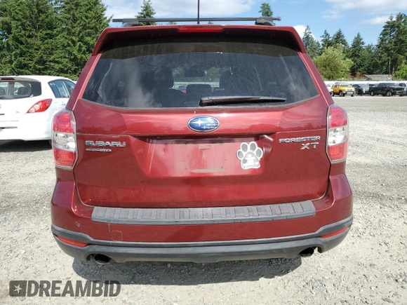 2014 Subaru Forester XT Touring with VIN JF2SJGMC0EH513844, listed as a Copart auction lot 61162355 with 56,887 mi miles and Salvage title. Bid and sale history available at DreamBid. Image 6.