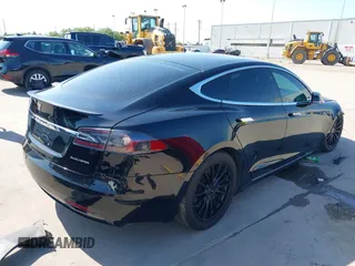 2021 Tesla Model S Long Range Plus with VIN 5YJSA1E28MF426080, listed as a IAAI auction lot 41979326 with 125,328 mi miles and . Bid and sale history available at DreamBid. Image 4.