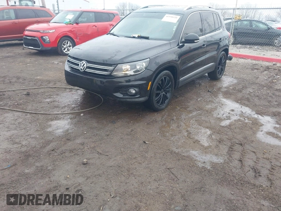 2012 Volkswagen Tiguan SE with VIN WVGAV7AX0CW602713, listed as a IAAI auction lot 41558520 with 95,678 mi miles and . Bid and sale history available at DreamBid. Image 17.