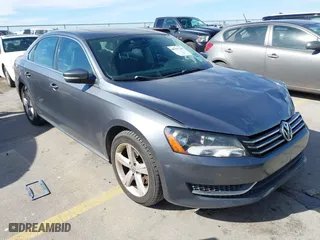 2013 Volkswagen Passat SE with VIN 1VWBP7A32DC144639, listed as a IAAI auction lot 41337338 with 147,878 mi miles. Bid and sale history available at carsss.com. Image 1.