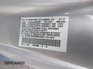 2013 Honda Odyssey EX-L with VIN 5FNRL5H69DB022042, listed as a IAAI auction lot 41902796 with 178,198 mi miles and . Bid and sale history available at carsss.com. Image 9.