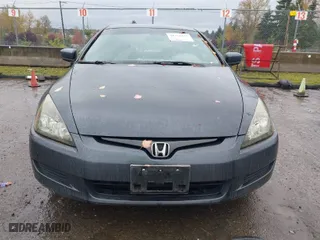 2003 Honda Accord Cpe LX with VIN 1HGCM72203A021097, listed as a IAAI auction lot 40762437 with 210,470 mi miles. Bid and sale history available at carsss.com. Image 6.